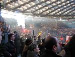 A bunch of rowdy Italian soccer fans. Apparently they light flares and throw explosives to support their team.