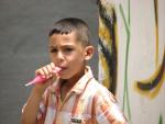 Shufat kid enjoying popsicle